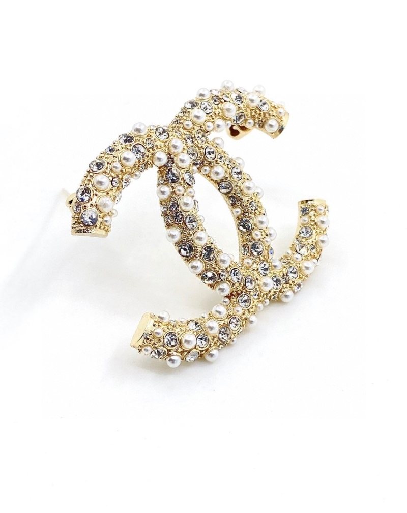 Ch**el brooches